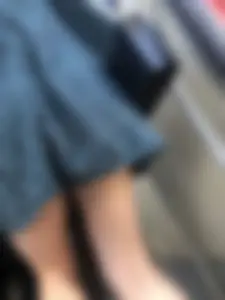 Cute candid girl in a dress at the train station