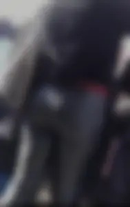 Milf shows off her shapely ass in her leather pants at the market