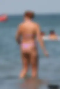 A bunch of sexy beach voyeur babes in bikinis, thongs and topless