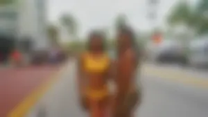 Two sexy ass black girls in thongs posing for the camera