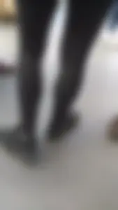 Girl wearing a black skirt over her leggings