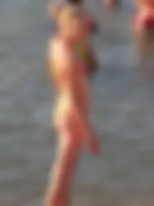 Adorable blonde teen at the beach