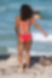 Christina Milian in red bikini in Miami with hard nipples