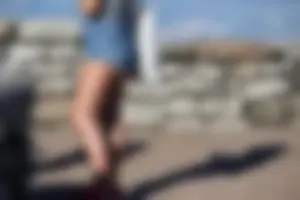 Sexy tourist in short jean shorts showing cheeks