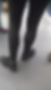 Girl wearing a black skirt over her leggings