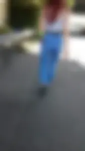Redhead with a nice ass in tight jeans walking