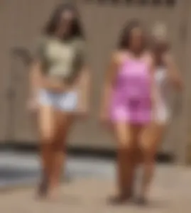 Three girls on the way to the ice cream parlor