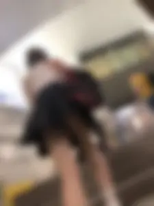 Candid girl in a skirt, low angle creepshots in a subway
