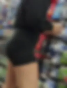 Blonde girl in black shorts