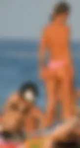A bunch of sexy beach voyeur babes in bikinis, thongs and topless
