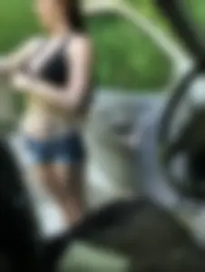 Someones girlfriend with nice tits in black bikini top and shorts