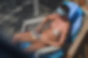 Creepshots of a neighbor milf in a bikini while sunbathing
