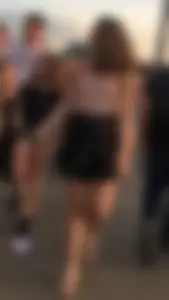 Braless beauty in tank top and skirt with puffy nipples