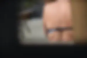 Creepshots of a neighbor milf in a bikini while sunbathing