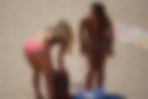 Beach volleyball babe with a nice ass in pink bikini bottom
