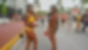 Two sexy ass black girls in thongs posing for the camera