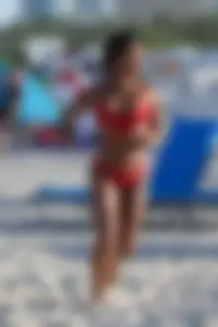 Christina Milian in red bikini in Miami with hard nipples