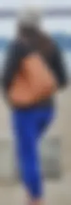 Cute girl with a nice ass in tight blue leggings along the water in San Fran