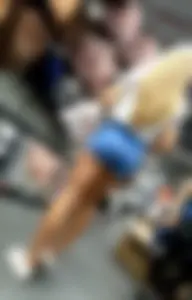 Candid Blonde in Blue Shorts With Gorgeous Ass and Legs at a Store Creepshot