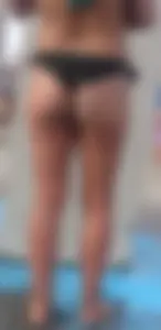 Beach shower milf in semi thong bikini with a nice ass