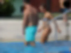 Sexy girl at the pool with a nice ass in thong bikini