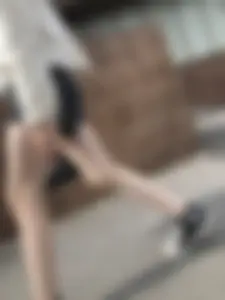 Cute candid teen with pale slim legs in shorts
