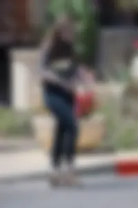 Thick booty brunette with nice ass in tight black jeans