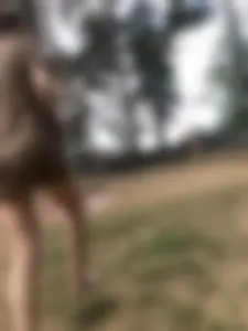 Girl in a Wet T-Shirt Walking in a Forest by a Lake Legs and Booty Closeups