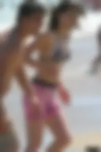 A bunch of sexy beach voyeur babes in bikinis, thongs and topless