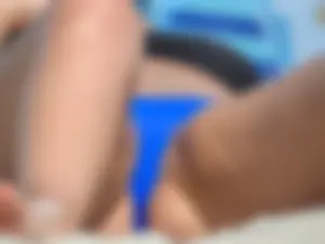 Closeups of sexy beach girls crotch in bikini