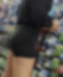 Blonde girl in black shorts