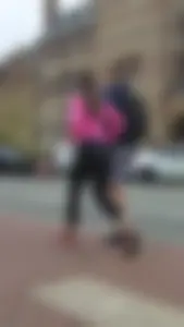 Brunette in black and pink