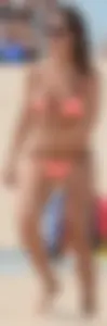 Girl in peach bikini on the beach with a great body and great ass