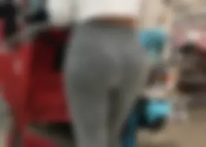 Sexy lady shopping at Target with a big ass in grey leggings