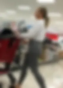 Sexy lady shopping at Target with a big ass in grey leggings
