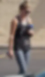 Skinny blonde in grey leggings with a friend