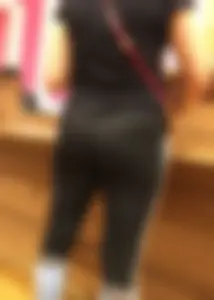 Mature sexy lady in Pink leggings shopping at Pink