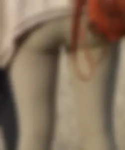 Cute skinny girl in light leggings with vpl