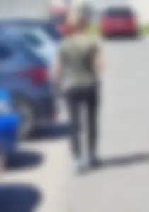 Skinny blonde milf at parking lot