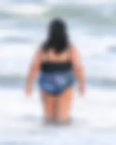 Extra thick girl at the beach in a bikini