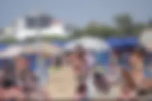 Girls on a nude beach in Bibione, Italy