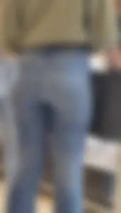 Girl wearing tight blue jeans at the store, closeups of her hot ass