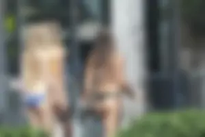 Group of teen friends in Florida in bikinis and thong