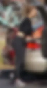 Sexy ass blonde in the parking lot in leggings with amazing body