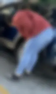Latina ass in tight jeans slight VPL at car wash bending over