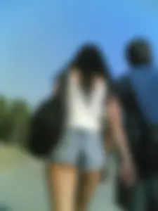 Street candid girl wearing mini shorts showing cheek creepshots