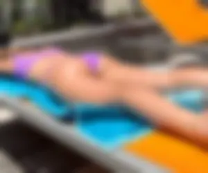 Prone Sunbathing Hottie Laying in Thong Bikini - ass legs and feet on full display (OC)