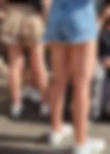 Sexy And Young Candid Girl in a Top And Denim Shorts Standing on the Street, Smoking Hot Legs Creepshot