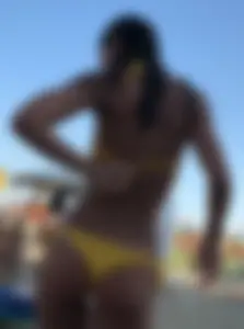 HOT girl in a wet yellow THONG bikini