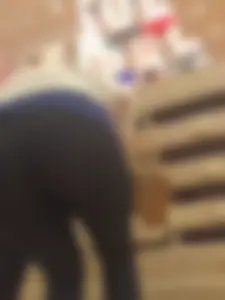Booty in Black Tights - Girl Bending Over at the Store